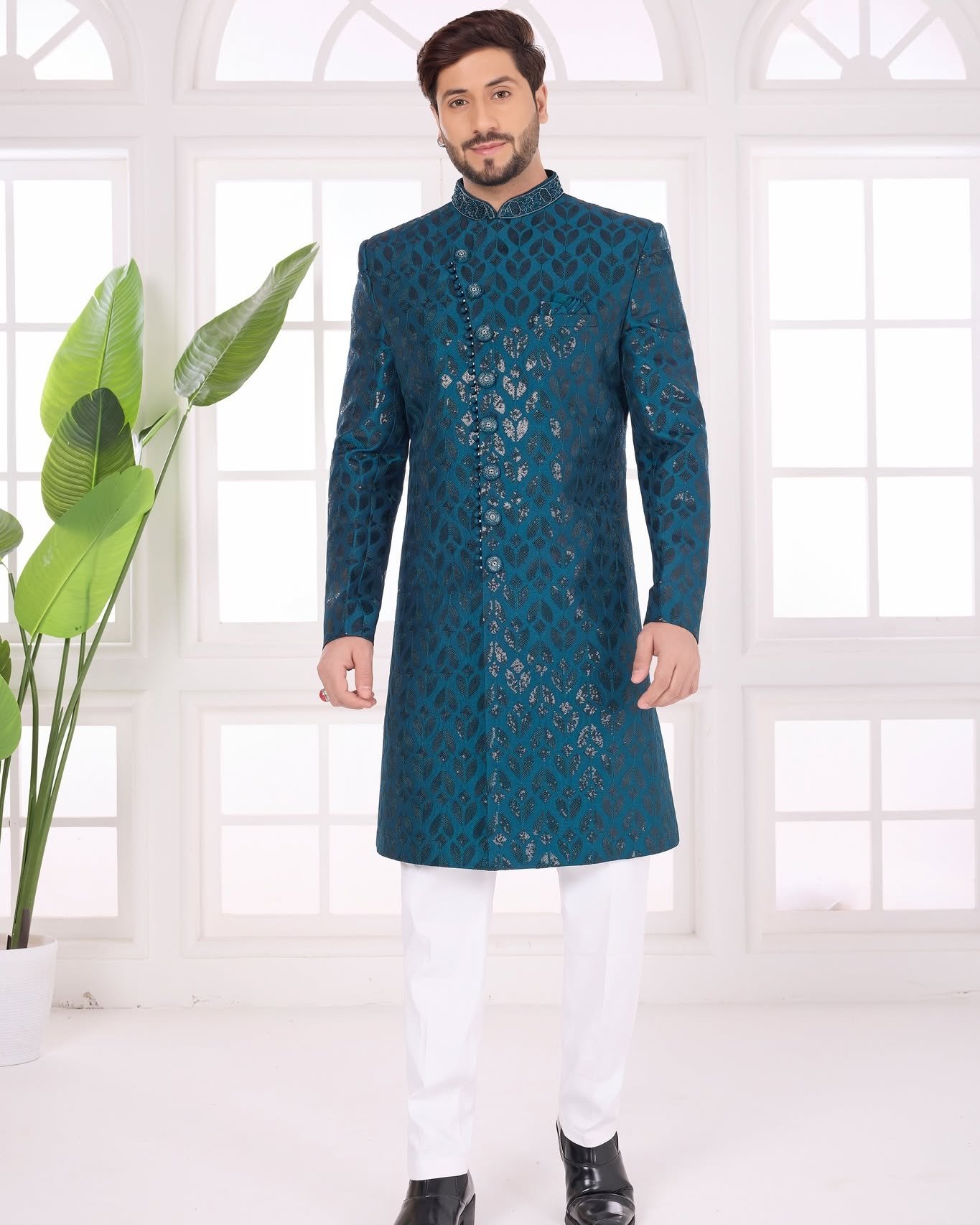 Step into the spotlight with this elegant Teal Green Designer Indo-Western Jacket Set